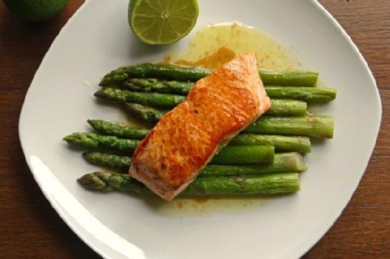 Pan-seared salmon with brown butter lime sauce and roasted asparagus