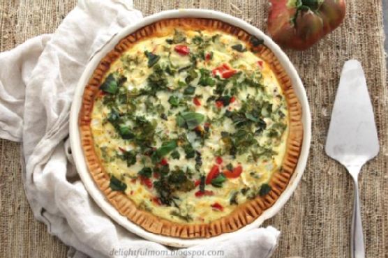 Vegetable Quiche Made With Fresh Tomatoes, Spinach, Basil and Goat Cheese